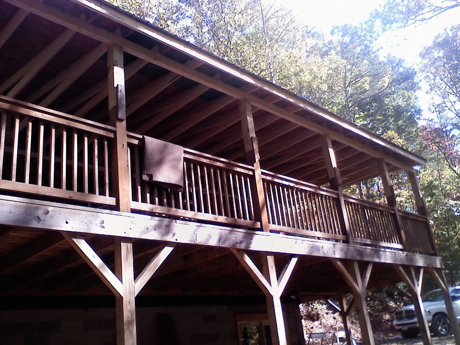 Timber framing under a new elevated porch and deck — Roof Leak Repair in Elk Point by Roofing Brothers